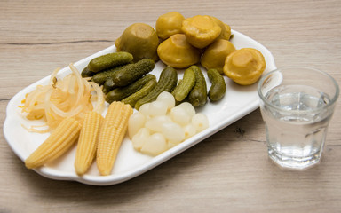 Snack to vodka. Pickled corn, squash, garlic.