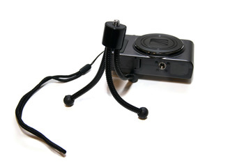 A small tripod for the camera and a small camera.