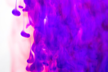 Obraz na płótnie Canvas Purple ink in the water.