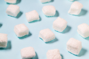 White Marshmallow on the blue background