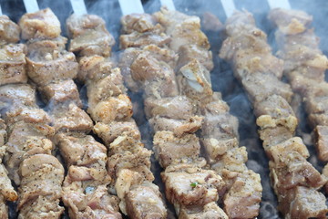pieces of meat on grill