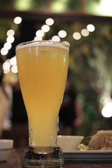 a 500ml glass of beer at the bar