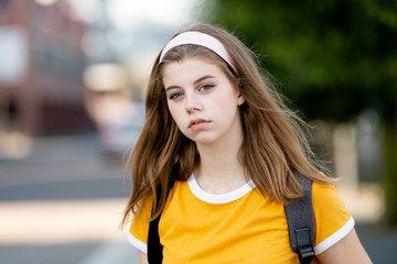 Young girl student with urban background
