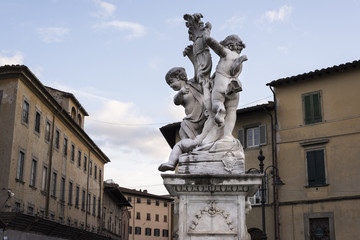 Fototapeta na wymiar beautiful marble fountain called La Fontana dei putti (The Fountain with Angels)