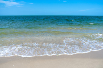 Fototapeta na wymiar Soft wave on the beach