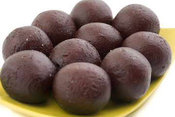 Indian Sweet Food Sweet Black Gulab Jamun Also Know as Kala Jamun, Black Jamun or Dry Kala Jam is a Popular Indian Dessert or Doughnuts for Festivals And Weddings