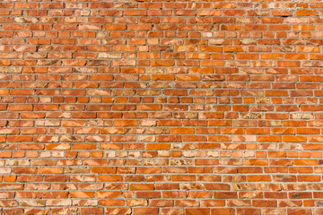 Background of old vintage red brick wall, texture.