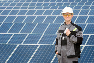 Solar panels engineer in white cask
