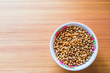 Fried Corn on the wooden Table