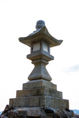 Stone carved Japanese lantern whit  on white background