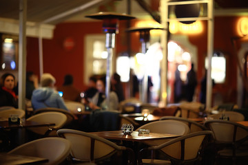 Fototapeta na wymiar blurred background in restaurant interior / serving and details in blurred bokeh background, concept catering, restaurant modern