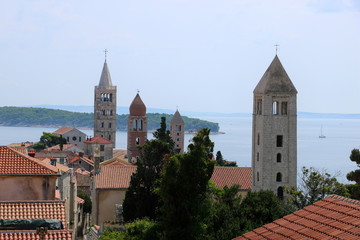 Fototapeta na wymiar Bell towers of island Rab, Croatia