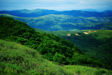 Fototapeta na wymiar landscape hills with forest