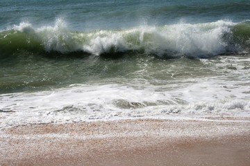 waves crashing on the beach
