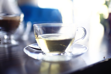 cup of green tea light Chinese green tonic tea