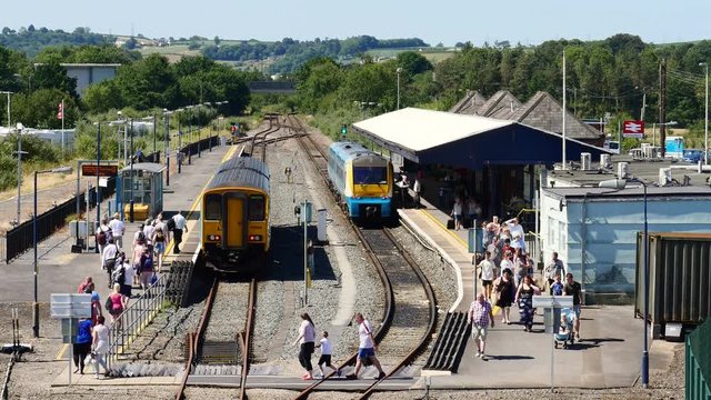 Passengers changing platforms, at Carmarthen railway station.