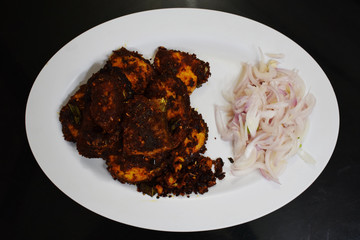 Fried fish with onion salad 