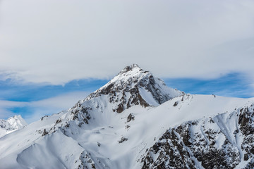 Fototapeta na wymiar Snow covered Mt. Semenov-Bashi summit