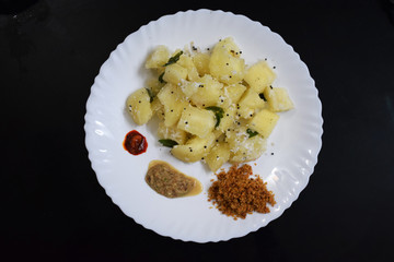Steamed tapioca with Chutney. One of traditional Kerala village food culture