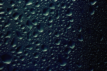 texture of a drop of rain on a glass wet transparent background