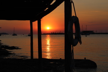 Beautiful sunset in fishing shack in San Antony de Portmany, Ibiza