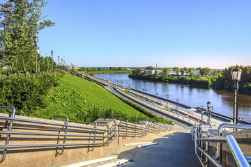 Fototapeta na wymiar Embankment of the river Tura in the city of Tyumen, Russia.