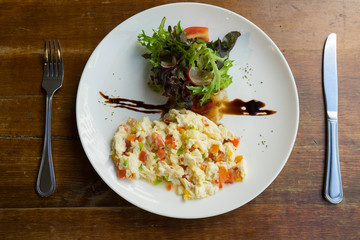 omelet with ham tomato and green salad healthy for breakfast, Top view