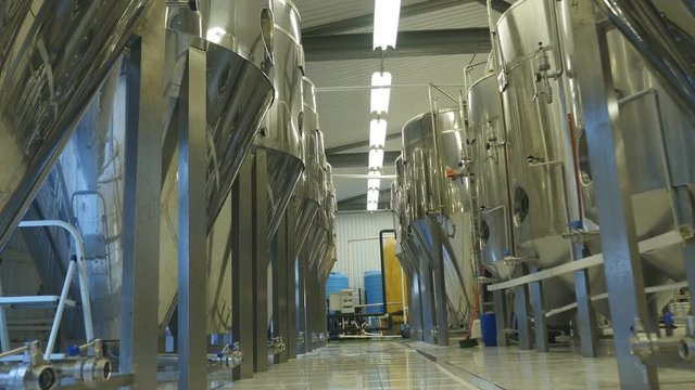 Large steel tanks with beer
