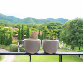 couple cup of coffee with mountains landscape.  Beauty nature background, copy space, relax time