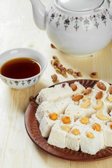 Turkish delight on a wooden table.