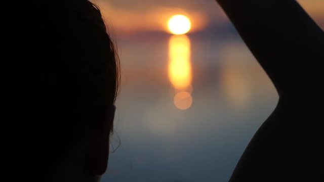 Meditation at sunset, keep your fingers in the heart sign. slowmotion, HD, 1920x1080