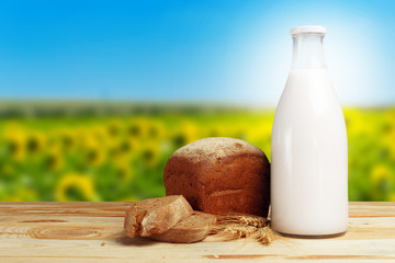 Bread and milk on the table