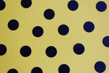 texture yellow background with black circles