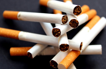 cigarettes with a filter lie in one heap