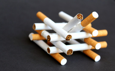 cigarettes with a filter lie in one heap