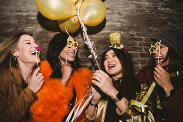 Group of girls celebrating and having fun the club. Concept about women night out