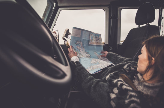 Woman looking at the map during the journey