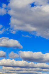 Clouds in the blue sky as an abstract background