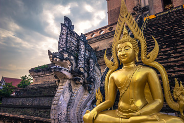 Chiang Mai - October 17, 2014: Golden Buddha statue in the Buddhist temple of Wat Chedi Luang in Chiang Mai, Thailand © rpbmedia