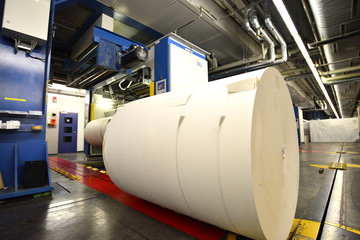 paper roll for printing in front of a web offset printing machine in a printing plant