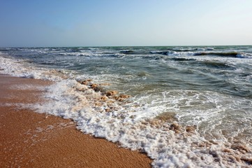 Stormy Sea. A sunny path on the waves.