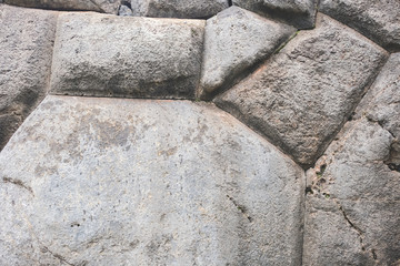 Background of stones that fit tightly to each other. The riddle. Secret