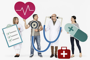 Happy people holding health care icons