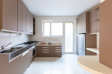Large kitchen with bright window