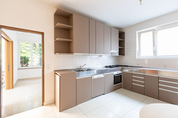 Large kitchen with bright window