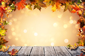 Fototapeta na wymiar Autumn background with falling leaves