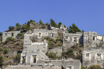 Fototapeta na wymiar Masonry rocky made old village in Turkey founded by old Greeks
