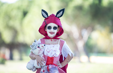 beautiful little girl dressed up for Halloween