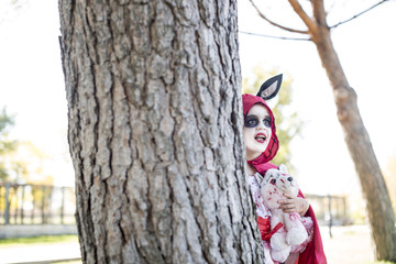 beautiful little girl dressed up for Halloween