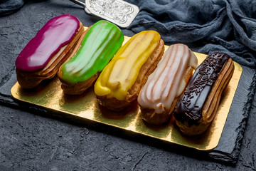 colorful eclairs on black